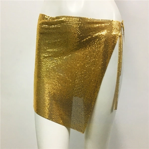 Detail view of gold sequin mini skirt with side chain closure on a white mannequin