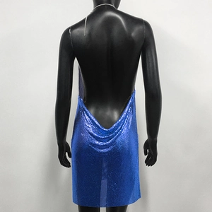 Detail of sea blue sequin metal mesh dress showing backless drape and chain straps