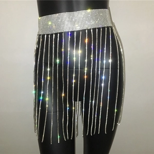 Close-up of sparkling rhinestone tassel waist chain with shimmering crystal fringes