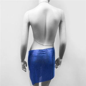 Detail of blue metallic sequin mini skirt with asymmetrical hem for clubwear