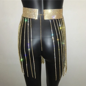 Detail of gold rhinestone body chain with long tassels and adjustable lobster clasp