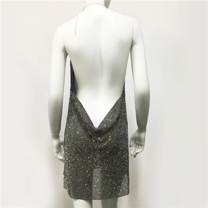 Detailed back view of rhinestone mini dress with deep cowl back and metal neck chains