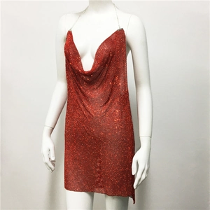 Detail view of the red metallic mesh dress with shimmering sequins and halter chain