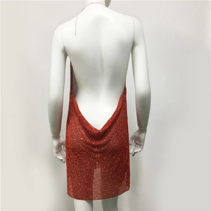 Detail of red rhinestone mesh fabric on a backless party dress for women