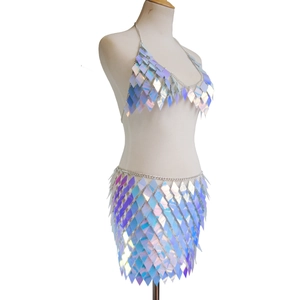 Detail view of laser sequins with metal chain connections on sequin skirt set