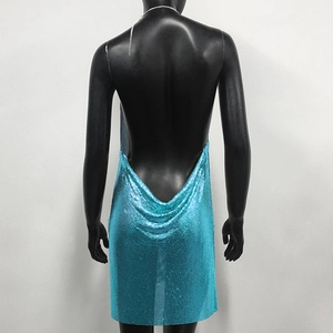 Detail of blue metallic mesh dress showing cowl back design and chain straps