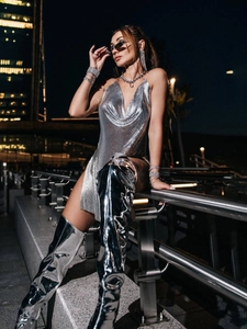 Silver metallic mesh halter V-neck dress and shiny over-the-knee boots for party events