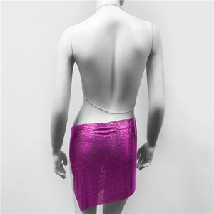 Detail of hot pink metallic mesh mini skirt with silver waist chain for party wear