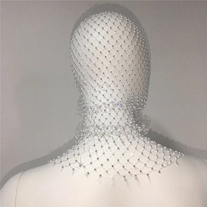 Detail of white rhinestone mesh headgear covering the head and shoulders in party style