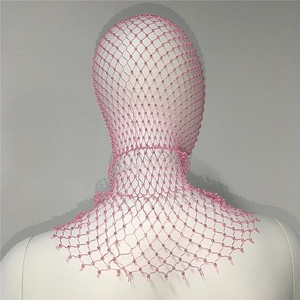 Detailed view of pink rhinestone fishnet headpiece on a white mannequin head display
