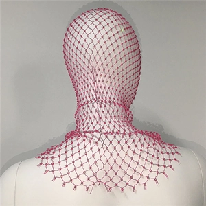 Detailed macro view of the rose pink beaded mesh headpiece with rhinestone finish