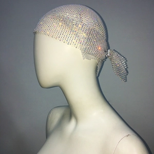 Detailed view of rhinestone fishnet headscarf with iridescent crystals and pony tail detail