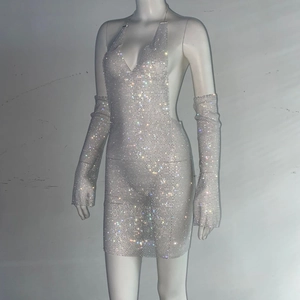 Detail of silver rhinestone halter mini dress with matching long sparkling arm sleeves