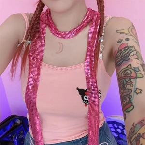 Detail of pink Y2K metallic sequin necktie and Kuromi embroidered tank top outfit