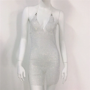 Detail of silver rhinestone mesh halter dress featuring plunging V-neckline on mannequin