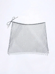 Detailed close-up of a black fishnet beach skirt featuring an adjustable side drawstring