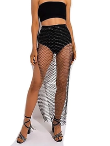Sexy black fishnet skirt with sparkling silver rhinestones on a model in front view