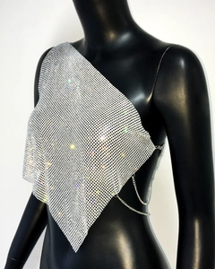 Detail of silver rhinestone mesh halter top with metallic chain and diamond shimmer