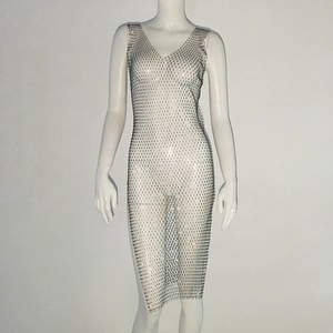 Detail of deep V-neck sleeveless mesh dress featuring sparkling rhinestones and crystal grid
