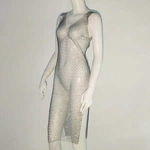 Detail of sparkling rhinestones on sleeveless V-neck mesh dress with high side slit