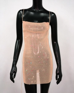 Close-up of beige sequin mesh mini dress with delicate straps and sparkling crystal details