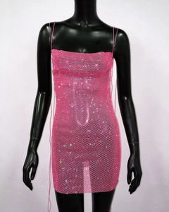 Detail of pink rhinestone mesh mini dress showing sparkling texture and slim fit