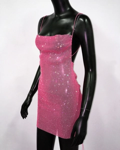 Detail view of pink rhinestone mesh mini dress with thin straps and open back
