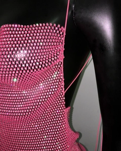 Detail of pink rhinestone mesh top with shimmering crystals for party wear