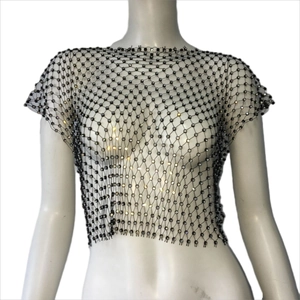 Close-up of black mesh sleeveless top featuring silver rhinestones and hollow net texture