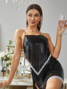Detailed view of black metal mesh sequin top with silver rhinestone trim for party
