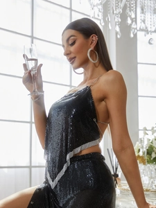 Sparkly black sequin crop top with silver rhinestone trim and elegant metal chain straps