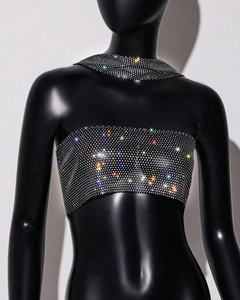Close-up of vibrant multi-color rhinestones on a stylish black tube top and choker set
