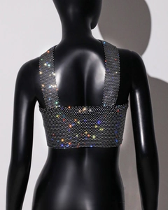 Rear view of cropped black camisole featuring colorful rhinestones and wide straps