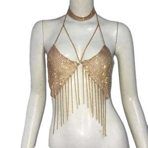 Golden rhinestone tassel body chain vest with halter neck design on a white mannequin