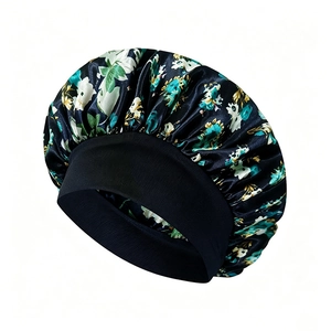 Floral satin sleep bonnet with wide elastic band in dark blue and cyan floral pattern