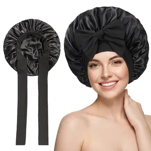 Black satin sleep bonnet with large bow and elastic band for women hair care
