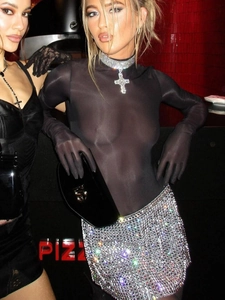 Sexy party set with sheer black long sleeve top and sparkly silver sequin mini skirt