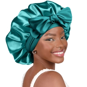 Double-layer satin sleep bonnet for hair care with large bow in deep teal color