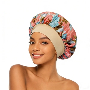 Detail of floral satin sleep bonnet with wide elastic band for hair protection