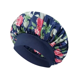 Floral print satin sleep cap for hair care with wide elastic band and navy blue flower pattern