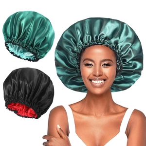 Elastic satin sleep bonnet for curly hair protection in dark green and black colors