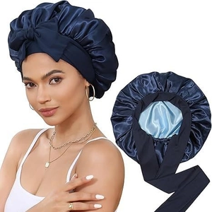 Double-layered satin sleep bonnet in navy blue with adjustable ribbon and silk texture