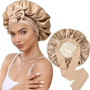 Double-layer satin sleep bonnet in champagne gold with adjustable bow ties for hair care