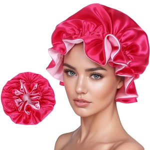Detail of adjustable double-layer satin bonnet with ruffle trim in rose pink and light pink