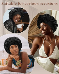 Detail of various black satin sleep bonnets showing the high-quality glossy silk texture