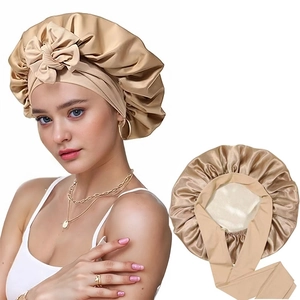 Champagne satin bonnet with elegant bow and wide ribbons for women's hair care