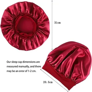 Kids burgundy satin sleep cap with elastic wide band and size dimensions on white background