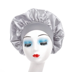 Detailed view of silver satin sleep bonnet featuring a comfortable wide elastic headband