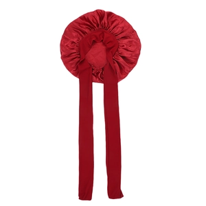 Red satin sleep cap with elastic wide ribbons for hair protection and beauty