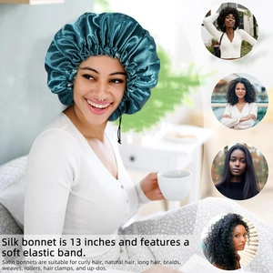 Deep teal 13 inch silk bonnet with a soft elastic band shown for hair protection